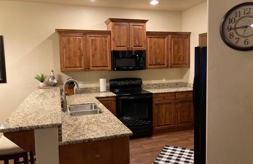 Cedar City House | Elegant Cedar Ridge Escape with clubhouse amenities - pool, hot tub, gym, grill.