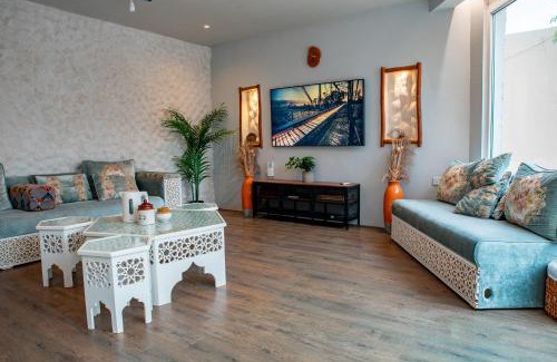 Umm Salal Villa | Elegant Garden Stay with 2 Living Areas, 2 Bedrooms, 1 Full and 1 Half Bath for 6 Guests