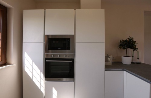 Belvedere Ostrense Apartment | Elegant new house with garden, veranda and shared pool