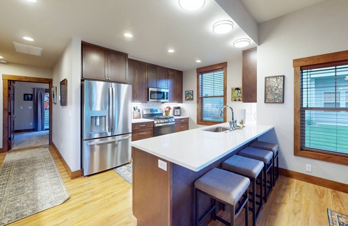 Dover Bay Condo | Elegant, newer, 1st-floor condo with private hot tub - steps to resort marina