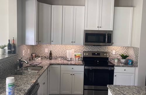 Grand Island House | Enchanting 5-bedroom house with AC in Grand Island, hot tub, patio, pool