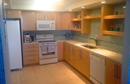 Redington Shores Condo | Enjoy Beachfront Living, relax in the heated pool, in gated community