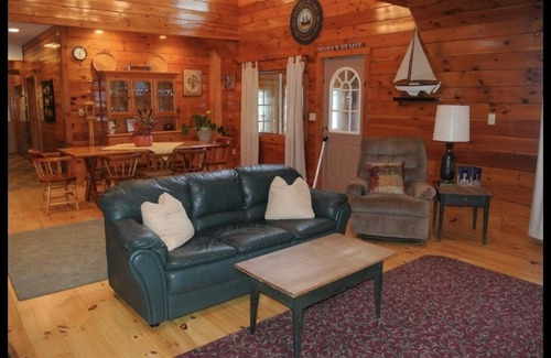 Gilmanton IW House | Enjoy lakefront life. Sleeps 12+. Gorgeous sunsets year-round on Crystal Lake