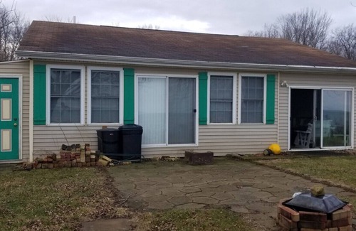 Geneva Cottage | Enjoy Lakefront Sunsets! Roomy 2 bed known as Water to Wine Lakefront Cottage