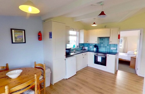 Hayle Cottage | Enjoying views towards St. Ives Bay and the Atlantic Branksea offers comfortable space to cosy down