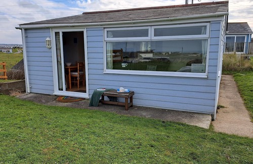 Hayle Cottage | Enjoying views towards St. Ives Bay and the Atlantic Branksea offers comfortable space to cosy down