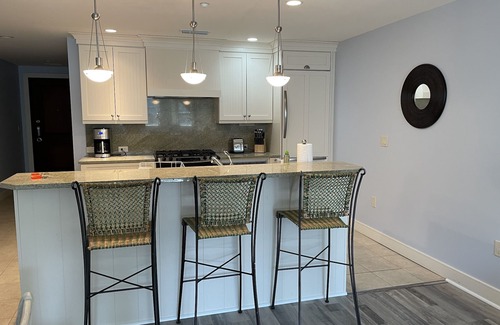 Traverse City Condo | Escape to Beachy Paradise in Stylish 2 Bedroom, 3 Bathroom Condo on the Water!