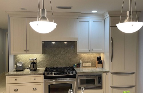 Traverse City Condo | Escape to Beachy Paradise in Stylish 2 Bedroom, 3 Bathroom Condo on the Water!