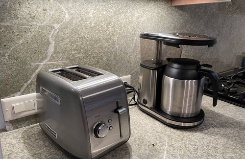 Traverse City Condo | Escape to Beachy Paradise in Stylish 2 Bedroom, 3 Bathroom Condo on the Water!