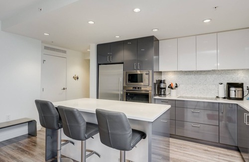 Downtown Victoria Condo | Escher Escape - Art-filled retreat with work desk nestled in the heart of downtown Victoria!