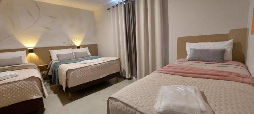 Reboucas Apartment | Espaço Harmonia - um apartamento inteiro e aconchegante para vc! Roupa de cama e banho linha hotel