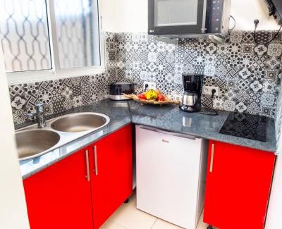 Port-Louis Apartment | Evasion en plein cœur de la ville Studio Jacuzzis Sauna et piscine au centre de Port-Louis