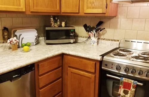 Chalet Village Condo | Everyone Welcome! Private WiFi, Heated Pool, Gas Grills, Catch the View!