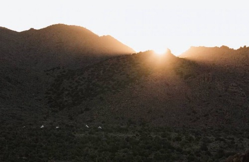 Yucca RV Rental | Everything · Camp Ravari: Six Tents & Tiny Home Desert Retreat