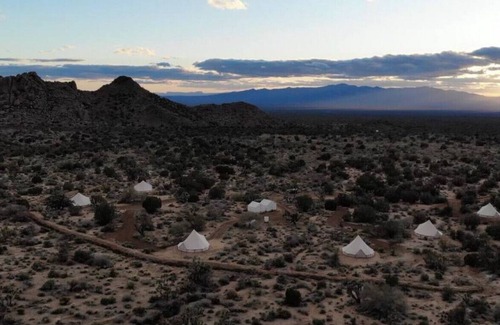 Yucca RV Rental | Everything · Camp Ravari: Six Tents & Tiny Home Desert Retreat
