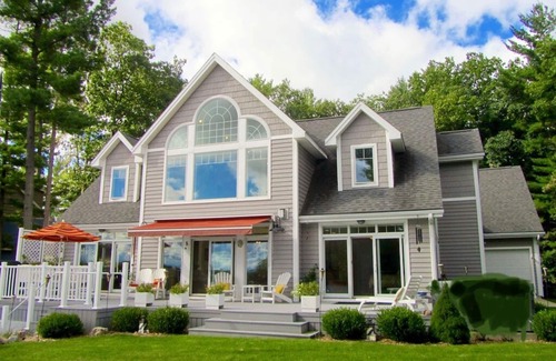 Mayfield House | Exceptional waterfront retreat with sandy beach!