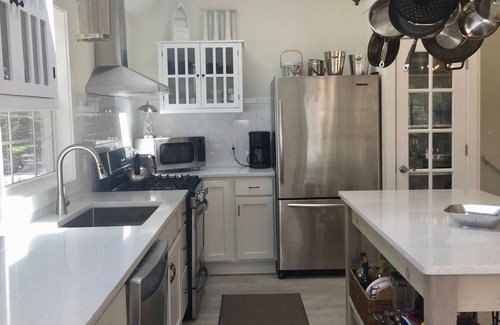 Powers Lake Villa | EXCLUSIVE LAKEFRONT with beach, beach house, piers, trampoline + sister villa