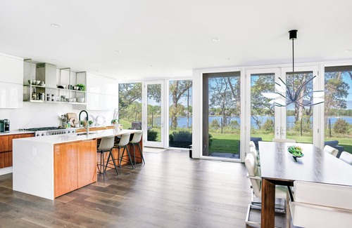 North Sea House | Expansive Southampton Home with Harbor Water Views, Private Pool, Modern.