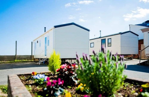Caister-on-Sea House | Experience comfort and relaxation in our charming caravan, perfect for your next getaway.
