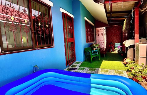 San Phak Wan House | Explore Chiang Mai while staying in a family friendly oasis nearby attractions.
