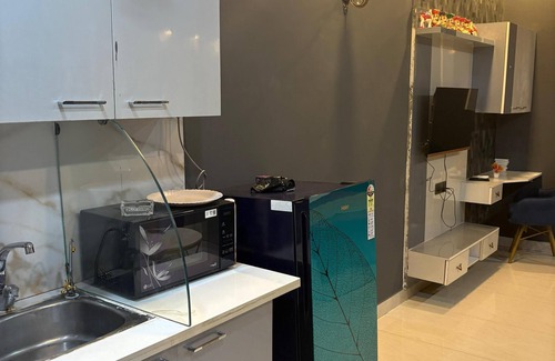 Greater Noida Apartment | Eye catching 1-bedroom apartment with WiFi, AC in serene Noida