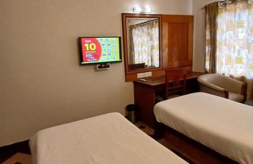 Rajajinagar House | FabHotel Aura Inn - RR Nagar