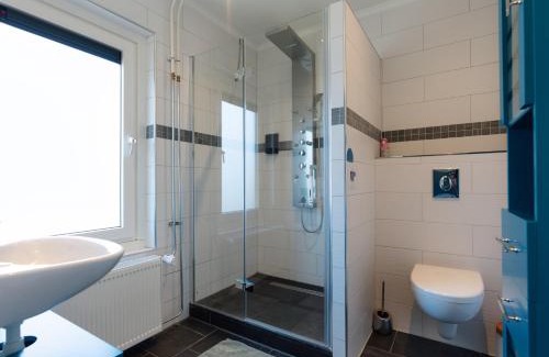 Ouddorp Bed & Breakfast | Familiekamer bij B&B Gezond aan Zee - Toegang wellnesstuin meerprijs