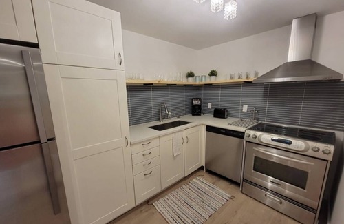 District of North Vancouver House | Family friendly Modern Garden Suite in Lynn Valley