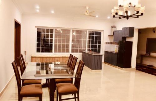 Islamabad Villa | Family Friendly Farmhouse Retreat: 3BR, Lawns, BBQ, errace, Chopal, Historic Water Well. Ideal for Work and Outdoor Activities. Close to Groceries, Cafés, Fully Secured Gated Community, CCTV