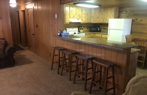 Pinetop-Lakeside Cabin | Family Friendly Lakefront Cedar Log Cabin on 2 acres at Rainbow Lake.