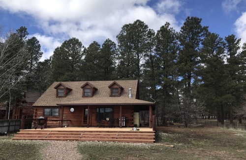 Pinetop-Lakeside Cabin | Family Friendly Lakefront Cedar Log Cabin on 2 acres at Rainbow Lake.