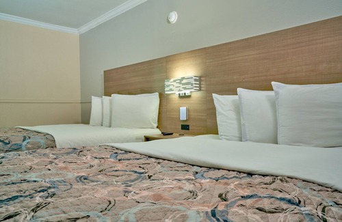 Bonanza Hotel | Family Garden Inn & Suites