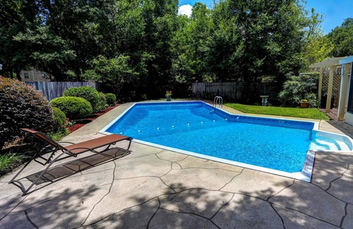 Northeast Pensacola House | Family home , Large salt water pool, not heated, and tropical courtyard