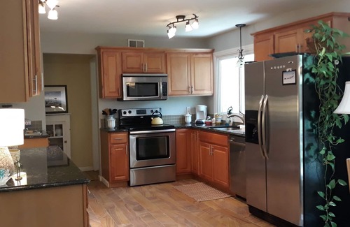 Overland Park House | Family Home, walk to Downtown Overland Park!