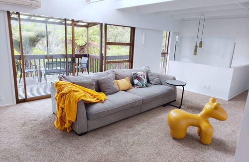 Glenfield House | Family room with door lock and self bathroom with bush view