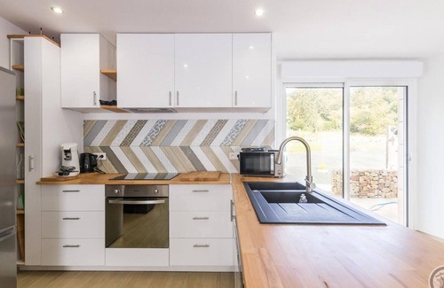 Tollevast Cottage | Family stone cottage with garden, spa, and children's games