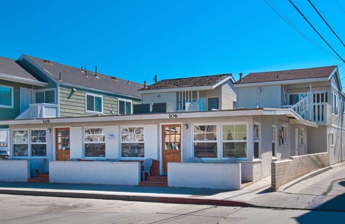 West Newport Condo | Fantastic and newly-remodeled upper unit just one house from the warm sand