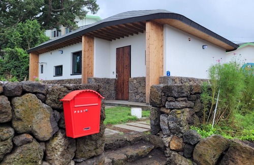 Pyeongdae-ri Villa | Feel Jeju-do's original village and small beach at Jooha's Jejudo House.