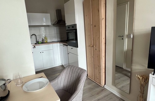 Segnitz Apartment | Feeling of clay Ecologically renovated low barrier