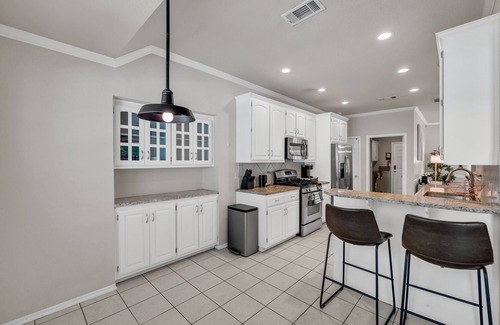 Tulsa House | Fenced in Pool-Jacuzzi Tub-Walk to Dining & Shopping-Garage Parking-Gym