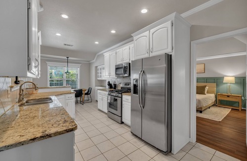 Tulsa House | Fenced in Pool-Jacuzzi Tub-Walk to Dining & Shopping-Garage Parking-Gym