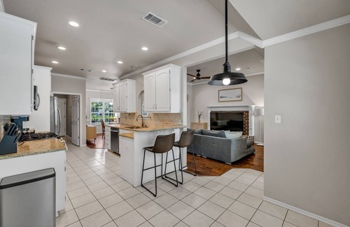 Tulsa House | Fenced in Pool-Jacuzzi Tub-Walk to Dining & Shopping-Garage Parking-Gym