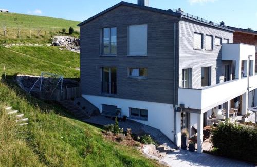 Scheidegg Apartment | Ferienapartment Allgäuträumchen - modernes Apartment im Allgäu mit Außensitzplatz