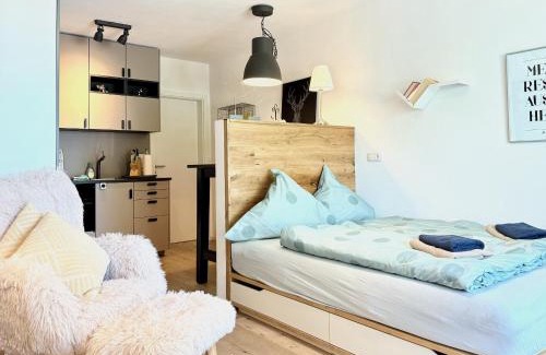 Scheidegg Apartment | Ferienapartment Allgäuträumchen - modernes Apartment im Allgäu mit Außensitzplatz