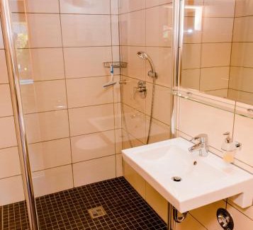 Thale House | Ferienhaus Hexenschlummer - Schlafzimmer und romantischer Schlafboden