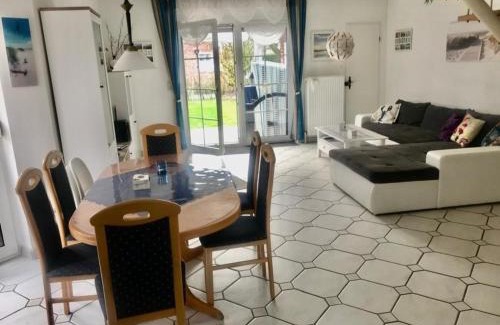 Neßmersiel House | Ferienhaus Huus Wattenmeer in Nessmersiel mit Garten, Terrasse, Sauna, Räder, und Grill