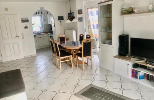 Neßmersiel House | Ferienhaus Huus Wattenmeer in Nessmersiel mit Garten, Terrasse, Sauna, Räder, und Grill