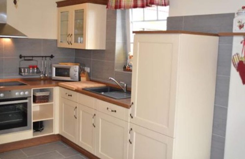Schonberger Strand House | Ferienhaus Kapitänshaus Niclas mit Sauna, Badewanne, Kamin und Wlan