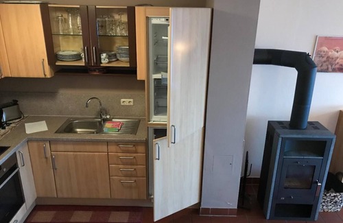 Zandt Apartment | Ferienhaus mit 2 Schlafzimmern, Kaminofen, Terrasse und Garten