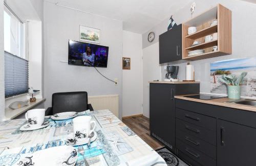 Neuharlingersiel Apartment | Ferienwohnung Ankerplatz im Gästehaus Kock